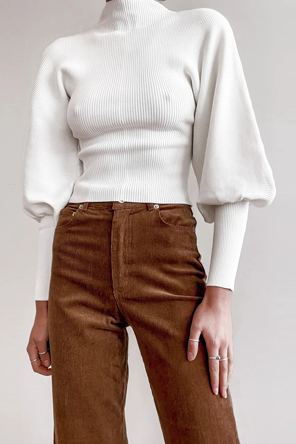 Stilla | Lækker sweater med rullekrave i ensfarvet patchwork