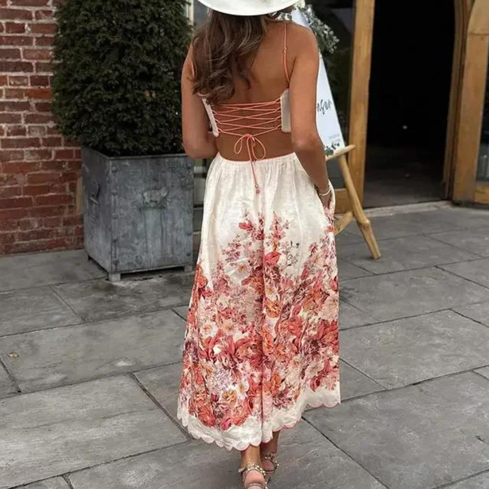 Stilla | Moderne Halterneck-Kjole med Blomsterprint og Ærmeløs A-Silhuet