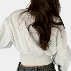 Stilla | Sweater med puffærmer og knapper i taljen